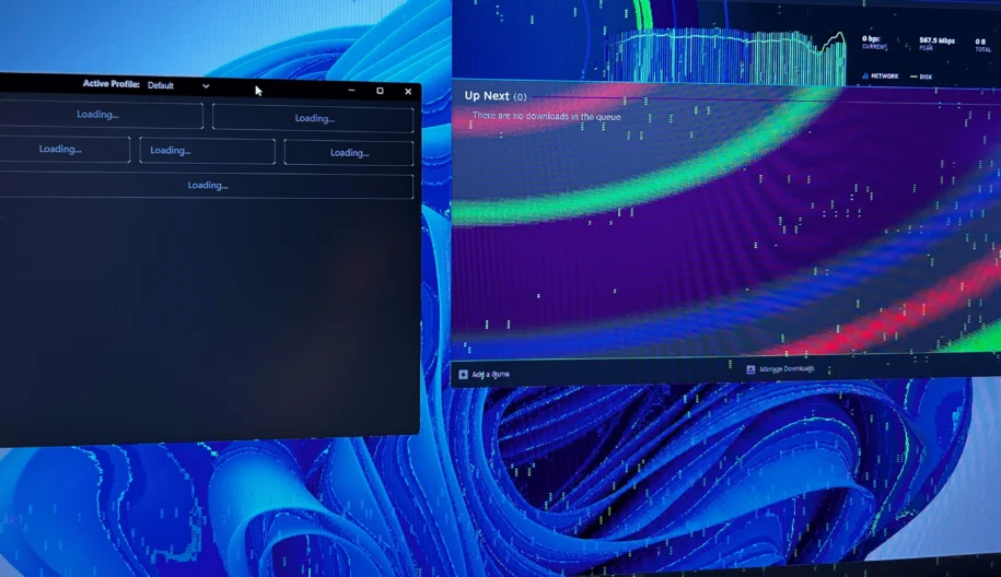 Image of computer monitor with green specs and squares known as "GPU artifacting"